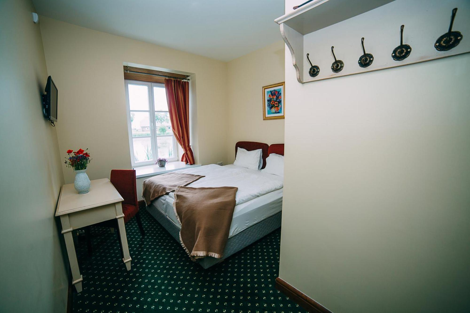 Готель Bistrampolis Manor Kuciai Номер фото